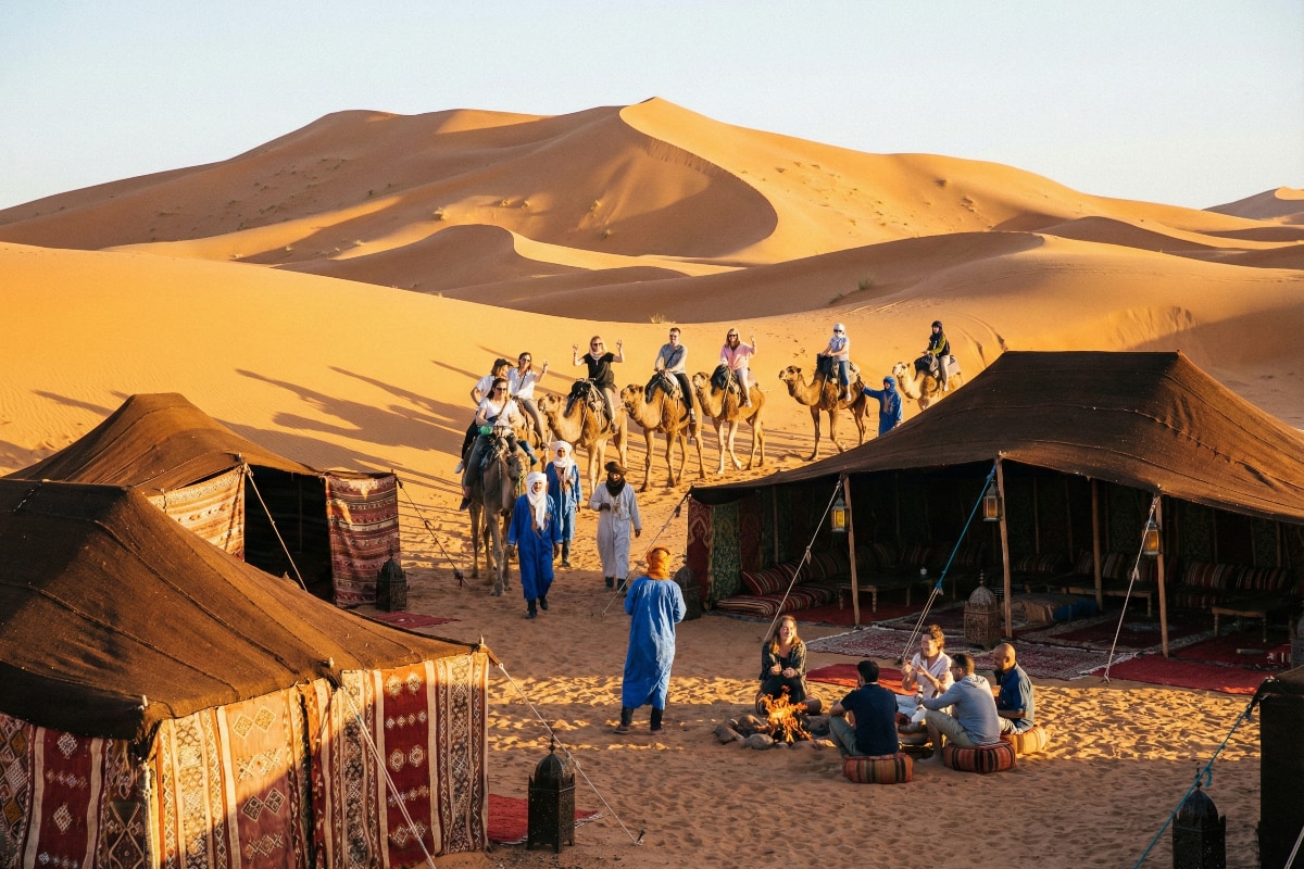 Exploring the Joys of Camel Trekking in Sahara Desert Camps